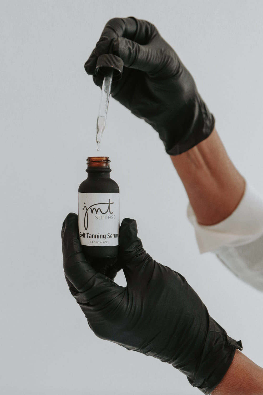 JMT self tanning serum with its glass dropper