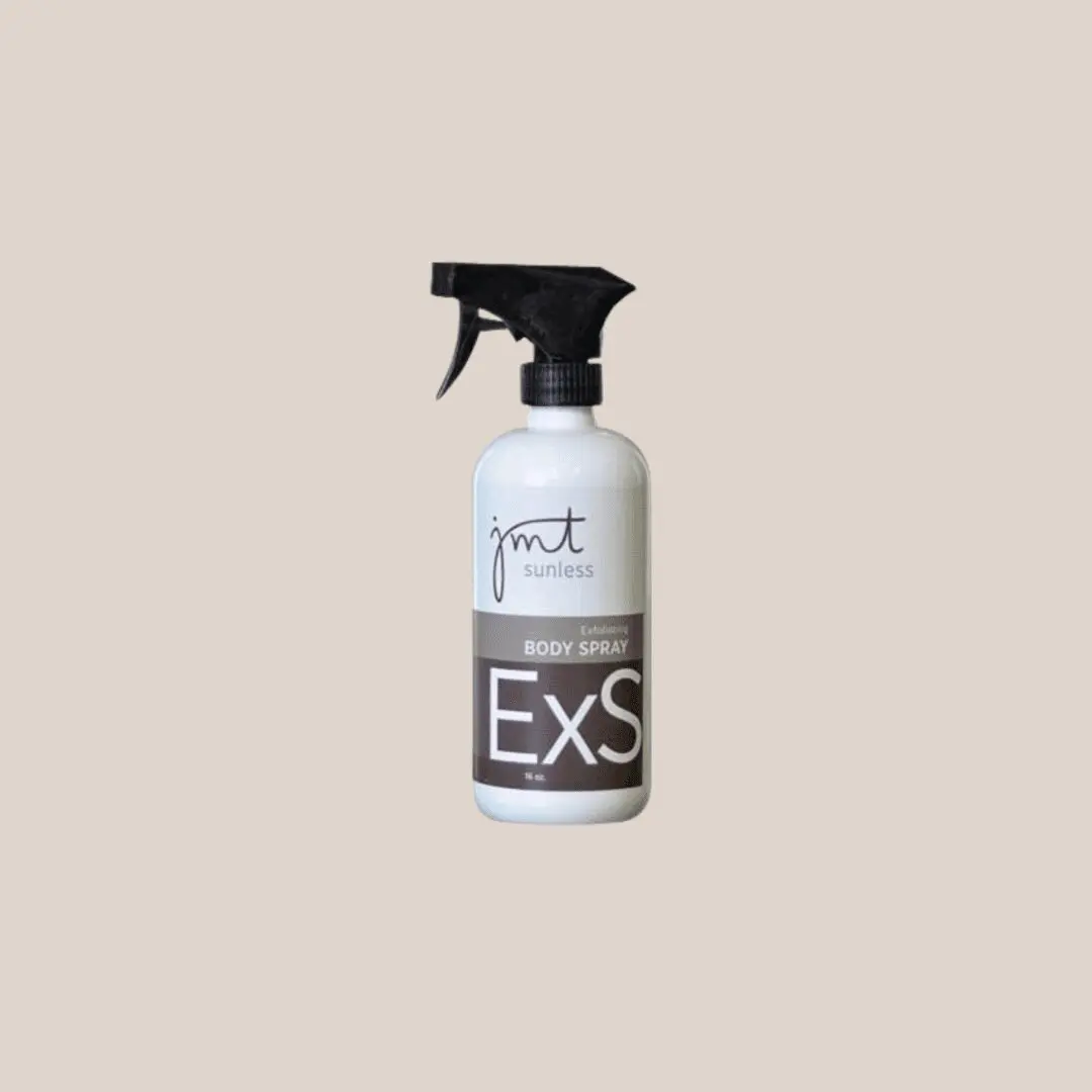 Exfoliating body spray in sleek bottle.